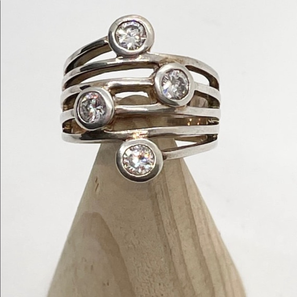 Vintage Precious Designs, silver ring with cz gems on a wide band size 6.75.